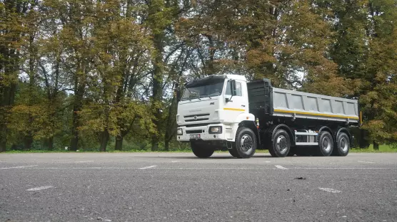 KAMAZ 8x4 65201 třístranný skl.
