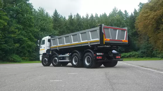 KAMAZ 8x4 65201 třístranný skl.